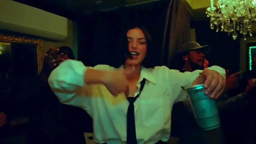 Still frame of the same person in the party take